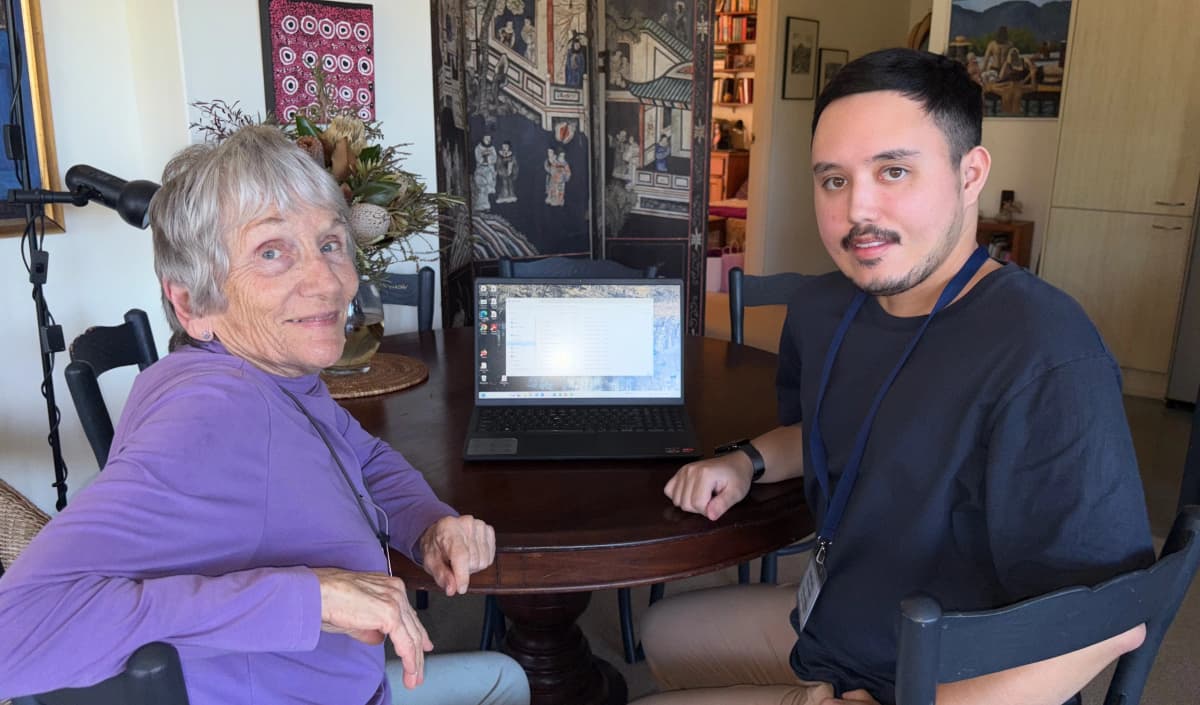 Nathan Helping Willa with Tech